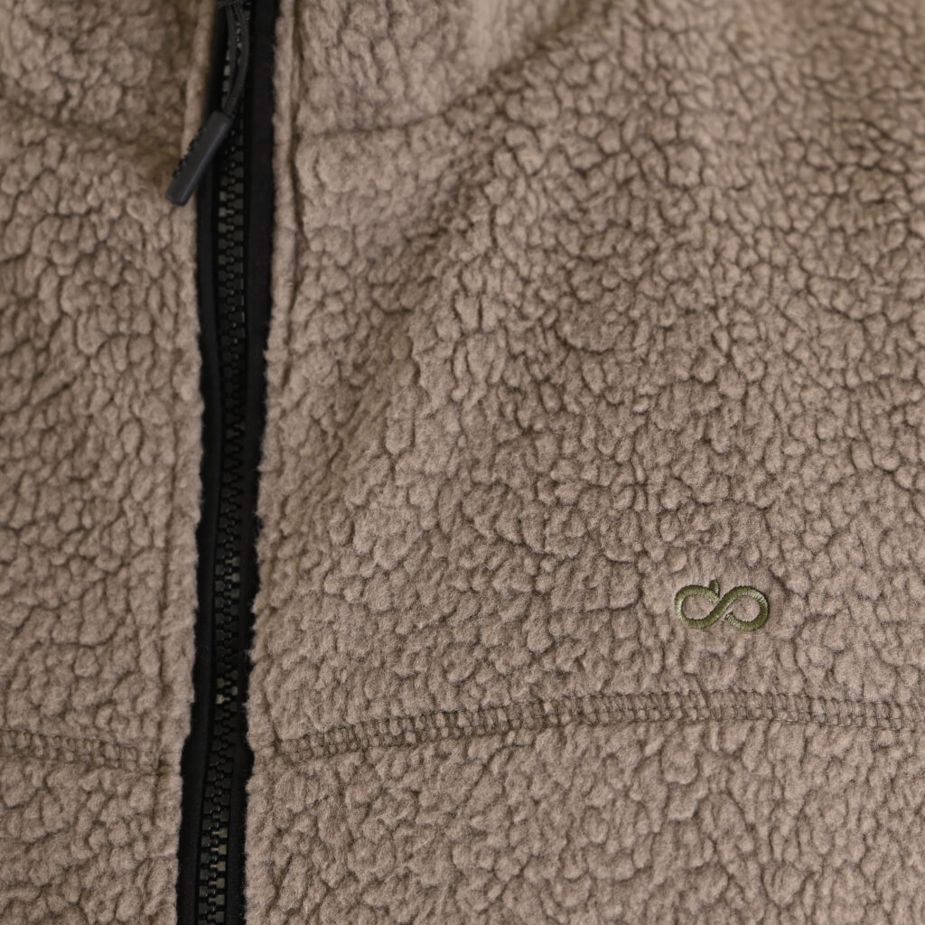 262MFT-7086 SHERPA SLEEVELESS FULL ZIP WITH CHEST EMBROIDERY TAUPE